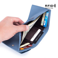 Nowe damskie torebki z naturalnej skóry kobiece portfele ze skóry bydlęcej Lady mała kieszonka na monety futerał na karty Rfid Mini portmonetka przenośne sprzęgło 2